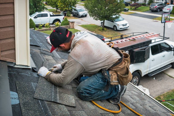 Professional Flat Roof Repair technician working in Benton, IA